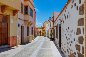 Colorful Traditional Street in Gran Canaria Old Town, Charming narrow street with colorful buildings and stone architecture in a historic.