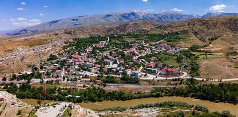 Obraz premium Aerial Views of Kemah Town and Highlands – Erzincan, Türkiye – Nature and Heritage from Above