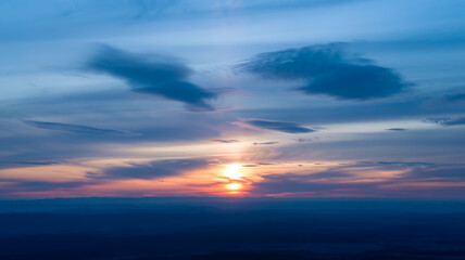Fototapeta premium Serene sunset paints the sky breathtaking hues of orange pink and blue a magical moment captured
