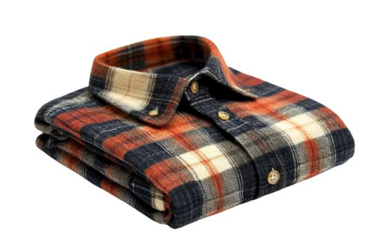 Warm autumn flannel shirt folded neatly orange and navy plaid soft texture button down collar cozy