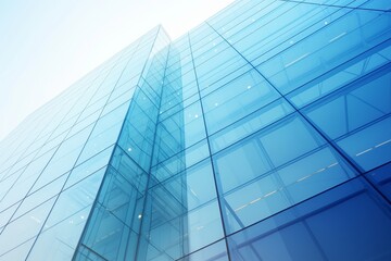 Modern glass building exterior, clear sky for text placement