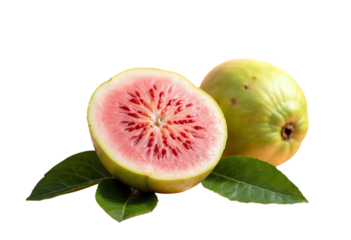 Pink guava fruit, cut in half, with leaves.
