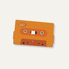 Obraz premium Vintage orange audio cassette tape labeled 