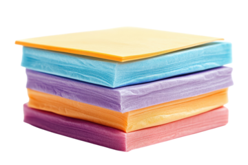 Stack of colorful pastel notepads bright hues soft texture clean background organized desk supplies