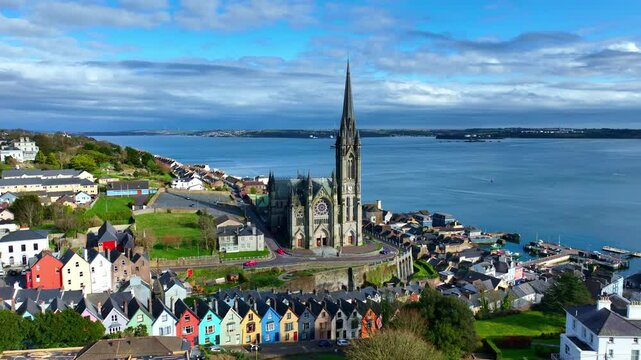 Cobh St Colman's church in Ireland in county Cork on a sunny day, travel in Ireland, drone view of famous Cobh church in Ireland