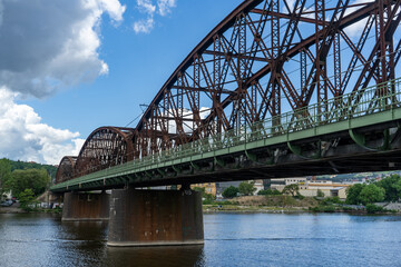 Old railway bridge and Vltava river in Prague