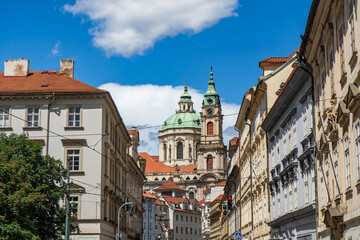 Cityscape on Mala Strana district with saint Nicholas church in Prague