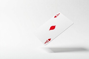 Obraz premium Close-up of a single playing card flipping mid-air, isolated on white , hearts, edge