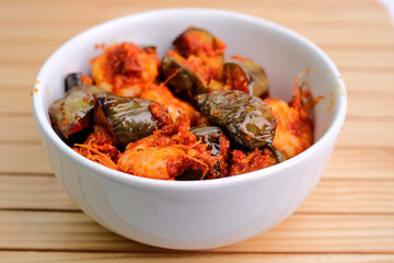 Shrimp And Eggplant Stir Fry In A White Bowl