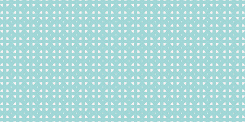 white polka dots pattern over blanched almond useful as a background