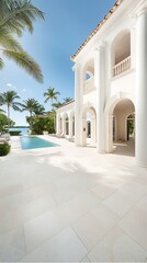 Luxurious white villa with a pool, sunlit patio, palm trees, and blue sky
