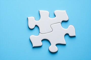 Obraz premium Two white puzzle pieces joined (1)