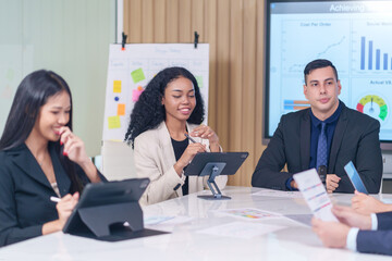 multiracial business team at work together,board meeting to analyze and discuss the situation on the financial report in the office