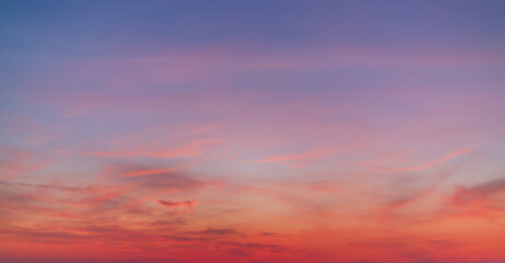 colorful clouds and sky,Dusk, Sunset Sky Clouds in the Evening with colorful Orange, Yellow, Pink and red sunlight and Dramatic storm clouds on Twilight sky, Landscape horizon