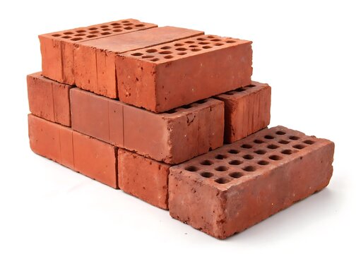 Fototapeta Stack of red bricks isolated on white background