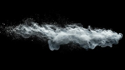 Abstract, light gray, wispy, smoke-like cloud, exploding or dispersing against black backdrop.  Particles of matter, like dust,  trailing behind