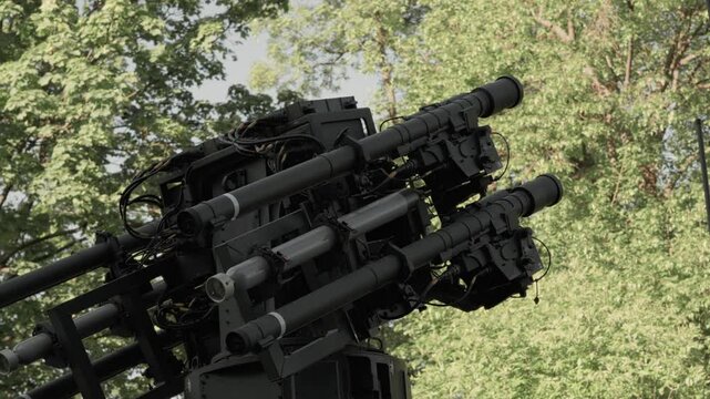 Detailed view of POPRAD anti-aircraft system in Poland. Features four GROM missile launchers, tracking-aiming head, thermal camera, laser range finder, and navigation module.