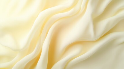 Obraz premium Soft and Smooth Yellow Fabric Texture with Gentle Waves and Flowing Drapes Perfect for Background and Textile Design Projects