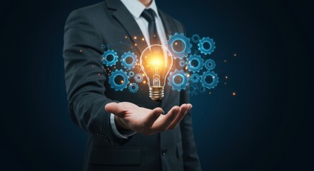 Innovative Business Ideas: A Glowing Lightbulb Held in a Businessman's Hand Representing Creative Solutions and Strategic Thinking