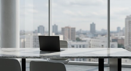 Fototapeta premium A sleek laptop sits on a modern marble table in a meeting room with large windows overlooking a sprawling cityscape.
