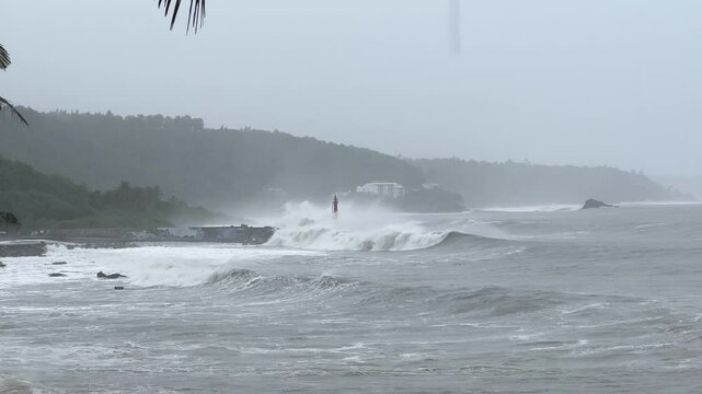 Large Hurricane Waves Crash Into Sea Wall And Lighthouse - Haikui