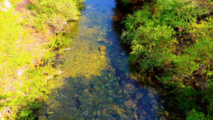 A view of a valley in early summer colored with green light. A beautiful natural view of Sillim, Gangwon Province, Korea's attraction, taken with a drone in the sky. A trip to Gangwon Province