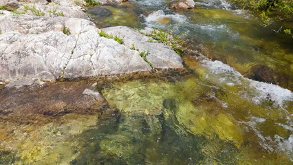 A view of a valley in early summer colored with green light. A beautiful natural view of Sillim, Gangwon Province, Korea's attraction, taken with a drone in the sky. A trip to Gangwon Province