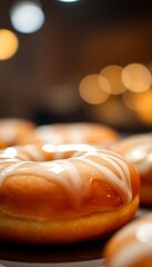 close up of glazed donuts with icing