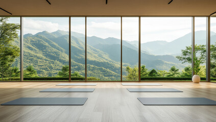 Serene yoga studio featuring panoramic windows that showcase breathtaking mountain views, creating peaceful atmosphere for practice