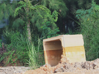 Naklejka premium Construction of precast reinforced concrete drainage pipes