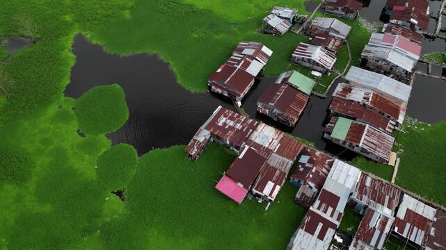 Houses on the water, flooding in the Peruvian Amazon, in the city of Iquitos, where the Nanay River rises and floods the houses on the riverbanks.