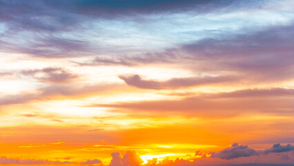 Beautiful sky background with evening light and fiery orange sunset