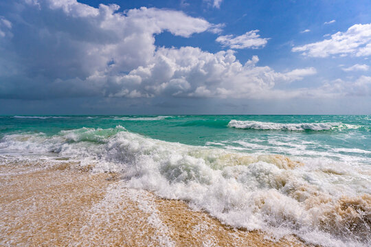 Fototapeta Sea waves background. Stormy sea waves. Summer sea beach wave. Rolling foamy sea beach waves. Refreshing ocean breeze. Dreamy beach background. Ocean waves background.