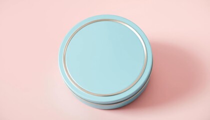 Pastel blue round metal tin with minimalist design on pastel background, aesthetic, soft