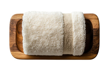 Luxurious rolled white towel in a rustic wooden tray perfect for spa or bathroom dark on transparent background