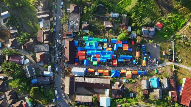 Drone footage of the traditional food market of Moni, in Flores Indonesia. The gateway for visiting Kelimutu mountain