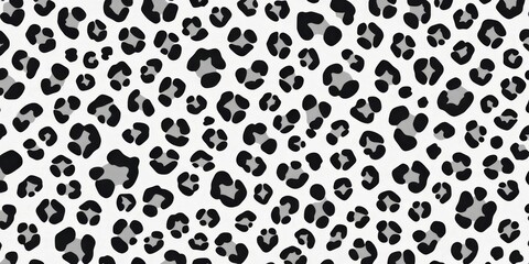 Subtle monochrome seamless cheetah print background with ample copy space, dots, graphic