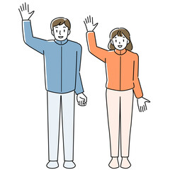 笑顔で手を振る女性と男性