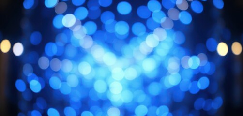 Abstract blue bokeh lights create a dreamy, ethereal background, tranquil, sophisticated