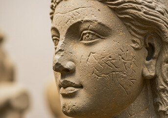 close-up of a serene ancient stone bust