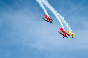Bi Planes performing stunts in the air © Michael