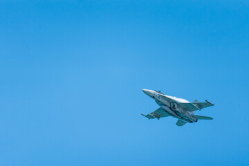 F18 Super Hornet performing maneuvers in the sky
