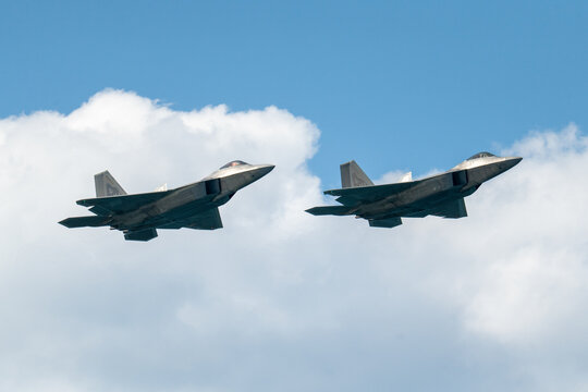 F35 and F22 flying in formation - Powered by Adobe