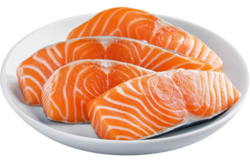 Raw salmon slices arranged on a round plate, showcasing the fish's marbling and vibrant color