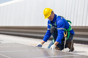 Man worker set installation and inspection standards of solar panels on roof of an industrial factory. Team technician inspection solar cell. Alternative innovation power environmental