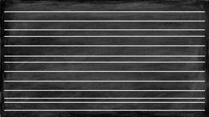 the image shows a dark rectangular object with horizontal lines. the object has a slightly textured surface, and its edges appear to be bordered by a frame