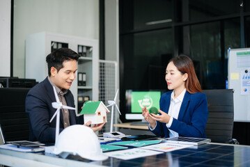 Team of industrial engineers meeting of renewable energy working on an  solar panel battery business model,ESG strategy