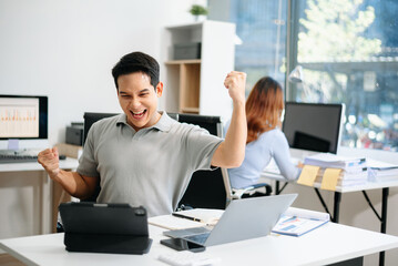 Businessman working  with laptop, tablet, and notes. Perfect for business, finance, accounting, and corporate strategy themes