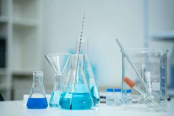 In the laboratory, chemistry equipment and biotechnology tools are carefully arranged for research, where scientists explore the chemical processes that drive medicine and science.