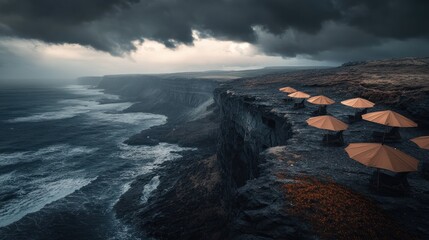 Fototapeta premium Cliffside umbrellas offer respite from dramatic weather